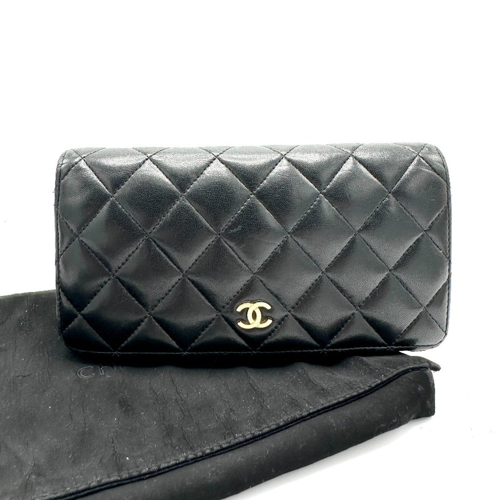 CHANEL Black Quilted Wallet with Gold Accent